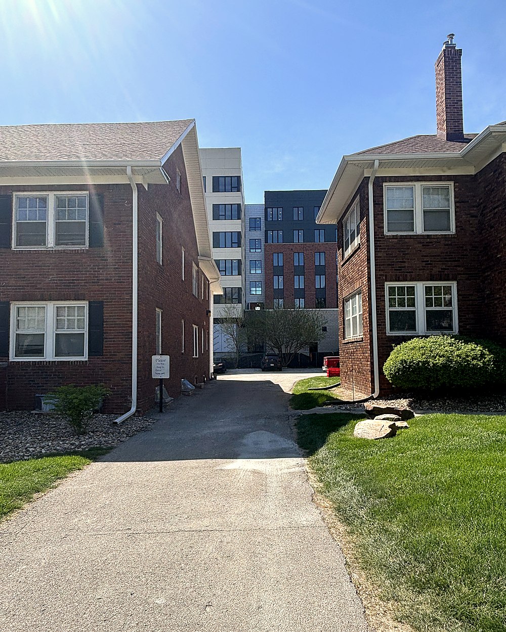 OSL three brick homes wide exterior view