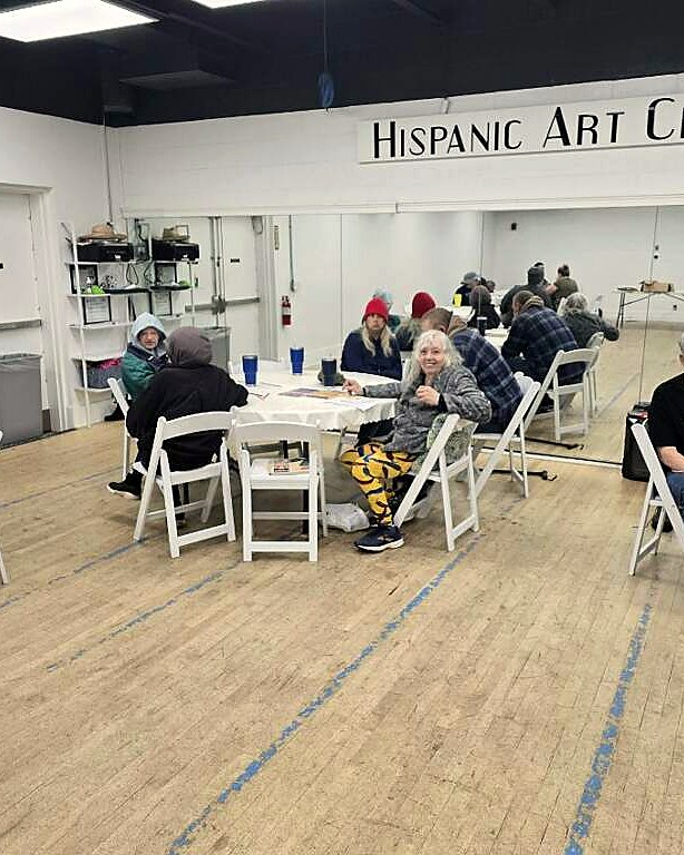 Residents enjoying a community event at the Hispanic Art Center of Omaha